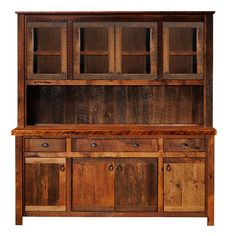 an old wooden hutch with drawers and cupboards