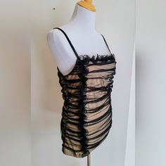 Excellent Condition. Never Worn. Black Mesh Overlay With Nude Lining. Black Ruffles Front And Back And Down One Side. Adjustable Straps. Measures 16" Pit To Pit And 25" In Length From Top Of Straps Down To Hemline. Very Sexy. Medium. By Boston Proper Black Ruched Tank Top For Party, Chic Ruched Tank Top For Night Out, Ruched Tank Top For Night Out, Fitted Ruffled Tank Camisole, Fitted Ruffle Tank Camisole, Chic Black Ruched Tank Top, Black Ruched Sleeveless Top, Black Sleeveless Ruched Top, Sleeveless Top With Ruched Sides For Night Out