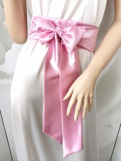 If you would like this belt in a different length or width, please, write to us. The Lilac wide satin belt. This extra long sash is 3 inches wide and 100 inches long. Belt material: stretch satin. The satin belt is available in the following colors: 1 White 2 Ivory 3 Champagne 4 Beige 5 Peach 6 Light pink 7 Pink 8 Lilac 9 Dark pink 10 Red 11 Burgundy 12 Terracotta 13 Gray 14 Dark brown 15 Black  16 Dark green 17 Sky blue 18 Royal blue 19 Navy blue  20 Aqua blue Satin Sash, Sash Belts, Wedding Dresses Satin, Dress Satin, Elastic Laces, Chantilly Lace, Stretch Satin, Suspender Belt, Suspenders