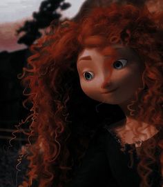 a close up of a doll with long red hair and blue eyes looking at the camera