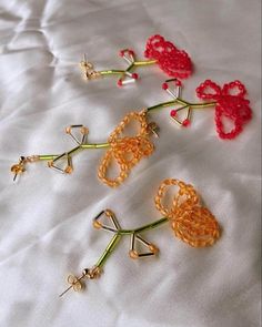 Handmade beaded Flower single drop earrings in 2 colours chrysanthemum and red . Trendy Red Flower Earrings For Gifts, Elegant Orange Flower Earrings For Gift, Red Flower Earrings With Colorful Beads As Gift, Red Beaded Flower Shaped Jewelry, Orange Flower Earrings With Colorful Beads For Gift, Red Beaded Flower Earrings, Flower Beaded Earrings With Flower Charm As Gift, Drop Beaded Earrings With Flower Charm As A Gift, Unique Red Flower Earrings