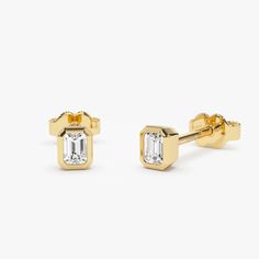 Emerald Cut Stud Earrings in 14k Solid Gold / Trending Diamond Studs / Natural Diamond Studs / Bezel Setting Studs by Ferkos Fine Jewelry Item Details * Made to Order * Gold Kt: 14K (also available in 18K) * Available Gold Colors: Rose Gold, Yellow Gold, White Gold * Height and Width: 4.25 x 3.4 MM * Emerald Cut Diamond: 2 Pcs   * Diamond Color & Clarity: G Color SI Clarity * Diamond Ctw: 0.24 ctw  * Ready to Ship in 1-2 Business Days If you have any additional questions about this ring, just hi Classic Yellow Gold Diamond Earrings With Bezel Setting, Classic Yellow Gold Earrings With Bezel Setting, Classic 14k Gold Diamond Earrings With Bezel Setting, Classic 14k Gold Earrings With Bezel Setting, 14k Gold Bezel Set Earrings For Anniversary, 14k White Gold Earrings With Bezel Setting, 14k White Gold Bezel Set Earrings, White Gold 14k Gold Earrings With Bezel Setting, White Gold 14k Bezel Set Earrings