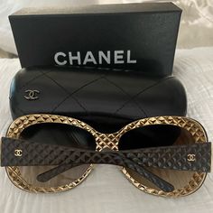 Chic Oval Shaped Gold-Tone Brown Quilted Chanel Sunglasses With Cc Logos On The Hinges Comes In Original Chanel Box, Case, And With Sunglass Cleaning Cloth! Pre-Owned In Perfect Condition. They Have Been Worn Maybe Once And Have Just Sat In The Box My Room As Decoration On My Dresser! Please Refer To Photos Regarding Box Condition As The Bottom Does Have A Few Marks, But Nothing You Can See When It Is Placed Upright. Message Me With Any Questions And Feel Free To Send In Some Offers ! Additional Luxury Glass Sunglasses For Beach, Luxury Brown Sunglasses For Beach, Designer Brown Sunglasses For Party, Vintage Chanel Sunglasses, Best Casual Dresses, Chanel Box, Chanel Inspired, Chanel Sunglasses, Boxing Conditioning