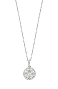 A dazzling display of white diamonds illuminates the circular pendant in this polished necklace handcrafted from 18-karat white gold. 16" length; 2" extender; 3/8"W x 1/2"L pendant Total diamond weight: 0.29ct. Color: G Clarity: VS 18k gold/diamond Imported >Diamond Guide Certified member of the Responsible Jewellery Council (RJC), which sets standards for supply chain integrity and sustainability throughout the global jewelry and watch industries Luxury Silver Diamond Necklace With Halo, Dazzling Platinum Diamond Necklace With Round Pendant, White Gold Pave Setting Round Pendant Necklace, White Gold Round Pendant Necklace With Pave Setting, White Gold Necklace With Pave Setting And Round Pendant, White Gold Diamond Necklace With Round Pendant, White Gold Diamond Pendant Necklace With Halo, Luxury White Gold Necklace With Halo Design, White Gold Diamond Necklace With Halo Setting