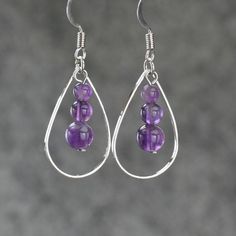 "The tear drop hoop earrings are handmade using amethyst, or coral, or turquoise. Free US shipping. Customers who purchased this item said: \"Very pretty, love these earrings \" The length of the earrings is 1 inches, or 2.5cm. (excluding the length of hook) Earrings are worn so close to the face, they are the most important accessories because it will siphon attention to our face. Earrings can compliment our face shape, enhance our good features, soften the jaw line, bring out the color of the Sterling Silver Teardrop Beaded Earrings, Hoop Earrings With Natural Stones For Gift, Hoop Earrings With Round Natural Stones For Gift, Gift Hoop Beaded Earrings, Spiritual Hoop Jewelry As Gift, Nickel-free Dangle Beaded Earrings As Gift, Wire Wrapped Dangle Hoop Earrings As Gift, Round Beaded Earrings With Natural Stones As Gift, Teardrop Earrings Gift