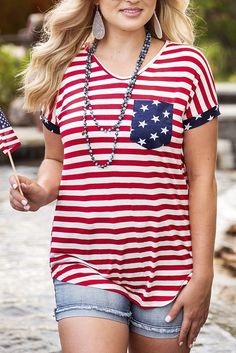 National Day Flag Print Tee Patriotic American Flag Print Short Sleeve Top, Spring American Flag Short Sleeve T-shirt, American Flag Crew Neck Top For Spring, Patriotic Red Tops For Memorial Day, American Flag Print Crew Neck Top For Memorial Day, Cotton Americana Flag Print Tops, Americana Cotton Tops With Flag Print, Spring American Flag Print Crew Neck Shirt, American Flag Print Crew Neck Shirt For Spring