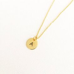 "initial necklace, hand stamped necklace, initial jewellery, personalised necklace, minimalist necklace, monogram necklace, gifts for her \"Less is more\" - Minimalist hand stamped 10mm gold, silver or rose gold plated initial disc - You can choose any letter from initials section to personalize it - Plated chain comes 16inch. Please send me message if you would like it 18inches. This beauty comes inside in a gift box. If your order is a gift, I would be happy to include a personal note for you. Delicate Hand Stamped Necklace For Gift, Gift Delicate Chain Charm Necklace With Round Pendant, Rose Gold Charm Necklaces For Gift, Rose Gold Charm Necklaces As Gift, Minimalist Hand Stamped Charm Necklace As Gift, Dainty Initial Necklace With Charms For Gift, Minimalist Personalized Charm Necklaces For Birthday Gift, Minimalist Initial Necklace With Charms As Gift, Minimalist Personalized Charm Necklace For Birthday