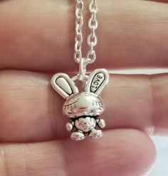 Check out this item in my Etsy shop https://www.etsy.com/listing/1399701656/cute-silver-bunny-necklace-easter-bunny Cute Silver Pendant Charm Necklace, Cute Silver Charm Necklaces With Lobster Clasp, Cute Silver Charm Necklaces, Cute Hypoallergenic Silver Charm Necklaces, Cute Charm Necklaces For Gifts, Cute Charm Necklaces As Gift, Kawaii Handmade Silver Necklaces, Kawaii Silver Handmade Necklaces, Cute Pendant Charm Necklace For Gift