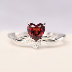 All HANDMADE ITEMS SHIP IN APPROX 8 DAYS Main Stone: Natural garnet Main Stone Size: Heart cut 6 mm x 6 mm Main Stone Weight: 1.15 carat Side Stone: CZ Height From The Ring Setting Bottom(to gemstone top): about 5.5 mm Width of Ring band Measure: gradually varied,about 1.6mm - 2.6 mm Material: 925 Sterling Silver/14K White Gold/14K Yellow Gold/14k Rose Gold Engraved: Available For FreeNo more than 13 letters) Customized:Of course! Tell me what you want Includes With Order: All of my store items Heart-shaped White Gold Birthstone Ring For Valentine's Day, Formal Heart Cut Birthstone Ring For Valentine's Day, White Gold Birthstone Ring For Valentine's Day, Sterling Silver Birthstone Ring For Valentine's Day, Valentine's Day White Gold Birthstone Ring With Center Stone, Valentine's Day White Gold Heart Ring With Birthstone, Valentine's Day Sterling Silver Birthstone Ring, Valentine's Day White Gold Birthstone Ring, Heart Shaped Ruby Ring In White Gold For Anniversary