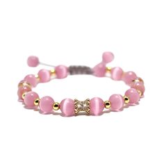 PRICES MAY VARY. Natural: This pink cat's Eye bracelet is handcrafted from authentic natural gemstone beads of high quality with hand-woven adjustable cord, odorless, lead-free, nickel-free and durable Healing Gemstone: The cat's eye is a symbol of inner peace. It exudes gentle energy that helps balance emotions, reduce stress, improve intuition and insight, stimulate creativity and inspiration, and help people face life's challenges with more confidence and optimism Size and Packaging: Beads are approximately 8mm in diameter, the bracelet has an adjustable inner diameter of 7 to 9.5 inches and is packaged in a high-end 3D levitating jewelry case Best Gift: This exquisite bracelet is wrapped in a high-end 3D floating jewelry case, making it a great gift for him/her Guarantee: HANDFCJH JL p Adjustable Healing Jewelry Gift, Rose Quartz 8mm Bead Jewelry As Gift, Rose Quartz 8mm Beads Jewelry Gift, Rose Quartz Beaded Bracelet Gift, Adjustable Healing Jewelry As A Gift, Pink Spiritual Crystal Bracelet Gift, Pink Spiritual Crystal Bracelet For Gifts, Spiritual Pink Crystal Bracelet As Gift, Adjustable Rose Quartz Jewelry With 8mm Beads