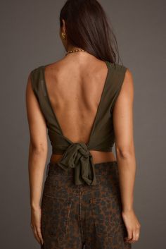 It's easy to say we’re obsessed with the Mila Olive Set, the newest color way of the Mila Set. This olive beauty features an open back and high neck, making it a must-have addition to your wardrobe. This top pairs perfectly with the Mila Olive Maxi Skirt and an olive martini in hand. Trust us, you’re going to need both colors—the olive and the leopard—to keep your style game strong all season long. Olive Martini, Fall Bottoms, Concert Top, Party Bottoms, Denim And Diamonds, Dresses Date Night, Bridal Tops, Concert Dresses, Fall Wedding Guest Dress