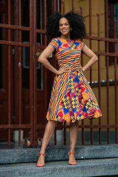 Embrace your femininity in this amazing flattering A-line Tendai dress. The print is bold with stunning colours which stand out from the crowd- because you aren't trying to hide wearing this gorgeous dress.  It's comfortable and flattering for all body shapes. You'll definitely enjoy the deep side pockets to keep your phone and car keys. Dress up with peep-toe heels or throw in some sneakers for that retro look.  Note: As to the size, pay attention to our size chart, then choose the most suitabl Kente Dress, Ankara Style, Peep Toe Heels, Retro Look, British Indian, Car Keys, The Deep, Gorgeous Dresses, Ankara