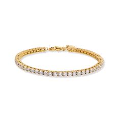 Indulge in the effortless elegance of the Lucinda Tennis bracelet. Featuring a stunning array of dazzling crystal stones that catch and reflect light, this bracelet will make your wrist the center of attention. Features: 14k Gold Vermeil 2.5 microns of solid gold electroplated over Sterling Silver 7” + 1” extender Hypoallergenic - Nickel and Lead Free Anti-tarnish E-coating At Südara, we are committed to providing our customers with beautiful, versatile jewelry of the utmost excellence. For addi Adjustable Gold Tennis Bracelet With Brilliant Cut, Gold Plated Bracelets With Diamond Accents, Elegant Tarnish-resistant Tennis Bracelet For Weddings, Dazzling Yellow Gold Jewelry With Sparkling Stones, Gold Tennis Bracelet With Prong Setting For Everyday Wear, Everyday Jewelry With Sparkling Cubic Zirconia Stones, Everyday Dazzling Cubic Zirconia Jewelry, Formal Yellow Gold Crystal Bracelet With Cubic Zirconia, Yellow Gold Crystal Jewelry With Brilliant Cut