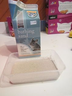 a box of sand sitting on top of a table