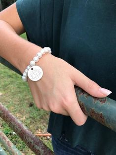 The three bracelets have been my SHOW SPECIALS this Fall at my holiday shows around the Southeast US. They are stretchy freshwater pearl bracelets that feature one of the three discs...silver, gold or antique brass. Engraved with your initials...just choose your finish and font! Wonderful bridesmaid gifts and also great for Sorority Lil Sis/Big Sis gifts. Classic Personalized Adjustable Pearl Bracelet, Personalized Adjustable Classic Pearl Bracelet, Classic Adjustable Personalized Pearl Bracelet, Adjustable White Monogram Jewelry, Adjustable Monogram Name Bracelet, Elegant Adjustable Initials Charm Bracelet, Classic White Jewelry For Personalized Gift, Customizable Elegant Beaded Bracelets For Personalized Gifts, Elegant Customizable Beaded Bracelets For Personalized Gifts