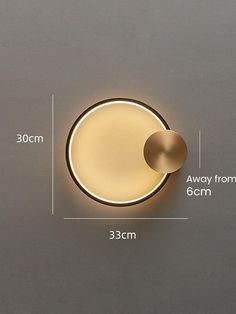 an image of a light that is on the wall with measurements for its size and width