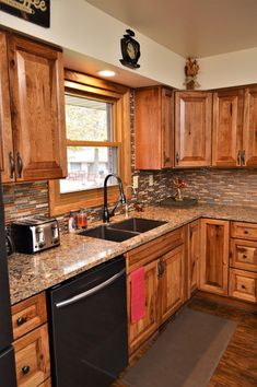 the kitchen is clean and ready for us to use it's new granite counter tops