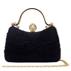 This stunning bow Shimmering clutch bag is the perfect accessory for a night out or any special occasions. The shimmering texture detailing is sure to catch the eye and add a touch of glamour to your outfit. The compact size is perfect for carrying just the essentials, and the clutch comes with a detachable metal chain strap for versatility. The bag features gold hardware, the clap is diamante rhinestone encrusted with a pearl on the inside. The two diamante encrusted grab handles lets you use it as a grab bag.  This sparkly bag is the perfect accessory for a wedding or party outfit. The glitter shades compliment party outfits. Pair with some matching sparkly shoes to stand out from the crowd. Dimension: W x H x D = 19cm x 12cm x 7cm approximately.      Perfect as a gift or present or just Wedding Clutch Bag, Sparkly Bag, Expensive Bag, Bow Clutch, Glitter Clutch, Clutch Bag Wedding, Sparkly Shoes, Silver Clutch, Gold Clutch