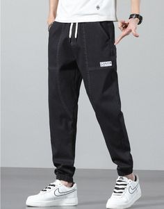 Vinny Denim Joggers are a pair of men's relaxed fit jogging pants that can pair with a streetwear or workout outfit. Featuring a relaxed fit, these joggers offer maximum comfort for men who want to feel comfortable all day long. Available in the following variants: Black, Blue, Grey Material: Cotton & Denim Style: Casual / Smart Casual Season: all seasons Gender: MEN Feature: Breathable/Comfortable, Stretched Size chart in CM Size chart in INCH Streetwear Straight Leg Cargo Jeans With Elastic Waistband, Streetwear Cargo Jeans With Elastic Waistband, Casual Relaxed Fit Joggers For Streetwear, Straight Leg Cargo Jeans With Elastic Waistband For Streetwear, Casual Joggers With Elastic Waistband For Streetwear, Casual Cotton Straight Leg Joggers, Sporty Straight Leg Denim Pants, Casual Jeans With Elastic Waistband For Streetwear, Sporty Denim Bottoms For Streetwear