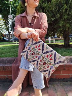 Turkish textile is very famous in the world. This is very light and fashionable clutch bag with traditional pattern of Turkish tiles. Both side are same pattern. Approx. Dimensions: H21cm x W 29cm Notice: * Because of the unique and handmade products, measurements above may be differ a little bit from the real one. * Actual colors may slightly different from those shown on screen. due to photographing and monitor color settings. * Inside of the bag,,color and pattern might change. Bohemian Rectangular Pouch, Bohemian Rectangular Clutch With Zipper Pouch, Bohemian Rectangular Clutch With Zipper, Bohemian Clutch With Zipper Pouch, Traditional Pouch For Daily Use, Traditional Beige Rectangular Clutch, Rectangular Woven Pouch, Traditional Woven Rectangular Clutch, Turkish Textiles