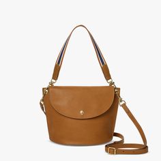 Convertible Birdy Bucket Bag | Shinola® Detroit Modern Bucket Shoulder Bag With Brass Hardware, Bucket Bag With Brass Hardware, Everyday Bucket Hobo Bag With Detachable Strap, Everyday Use Hobo Bag With Detachable Strap, Everyday Use Bucket Shoulder Bag With Gold-tone Hardware, Bucket Shape Satchel With Detachable Handle For Everyday Use, Everyday Satchel With Detachable Handle And Bucket Shape, Modern Leather Bucket Bag With Brass Hardware, Everyday Use Bucket Shaped Satchel With Detachable Handle