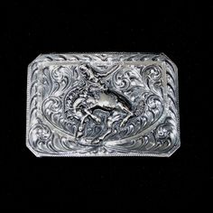 Vogt Silversmiths Trophy Buckles The Centennial Bronc Channel Buckle Formal Engraved Belt Buckles, Western Engraved Belt For Formal Occasions, Western Style Engraved Belt For Formal Occasions, Elegant Hand Tooled Belt Buckles For Formal Occasions, Elegant Hand Tooled Belt Buckles For Formal Wear, Elegant Formal Hand-tooled Belt Buckles, Classic Concho Belt Buckles For Rodeo, Western Style Antique Belt Buckle For Formal Occasion, Western Style Antique Belt Buckle For Formal Wear