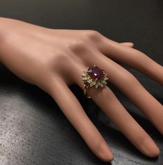 6.00 Carats Impressive Red Ruby and Diamond 14K Yellow Gold Ring Suggested Replacement Value $4,800.00 Total Red Ruby Weight is: 5.25 Carats (glass filled) Ruby Measures: 12.14 x 9.65mm Natural Round Diamonds Weight: .75 Carats (color G / Clarity SI1) Ring total weight: 5.8 grams Disclaimer: all weights, measurements and colors are approximate and may vary slightly from the listed dimensions or as seen in the image. All pictures are magnified to show the smallest of details. Please, refer to the Elegant Ruby Ring With Diamond For Party, Luxury Ruby Cluster Ring, Fine Jewelry Ruby Ring With Diamond For Party, Party Fine Jewelry Ruby Ring With Diamond, Luxury Red Pear-shaped Jewelry, Luxury Red Cluster Diamond Ring, Luxury Pear-shaped Ruby Jewelry, Luxury Cluster Ruby Ring Gift, Formal Red Rings