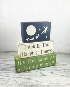 three books stacked on top of each other with the words think of the happest things it's the same as having wings