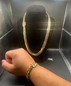 PRODUCT IS BACK IN STOCK AND READY TO SHIP - GRAB YOURS NOW BEFORE THEY'RE GONE AGAIN! 🚀🔥 CHAIN SIZE -24 INCH BRACELET SIZE - 8 INCH  the epitome of timeless elegance and luxury. Crafted with precision and attention to detail, this set boasts a dazzling 5x layer of real gold, ensuring a radiant and enduring shine that captivates both men and women alike. The 12mm width of the chain and bracelet exudes a bold and confident style, making it a statement piece for any occasion. Each link is meticu Gold Plated Cuban Link Chain Necklace, Cuban Link Gold Chain Necklace, Cuban Link Gold Chain Jewelry, Gold Plated Cuban Link Chain Necklace Tarnish Resistant, Gold Cuban Link Bracelet As Gift, Luxury Cuban Link Necklace With Figaro Chain, Gold Plated Chunky Cuban Link Chain, Cuban Link Bracelet Gift, Gold Plated Cuban Link Chain Bracelet