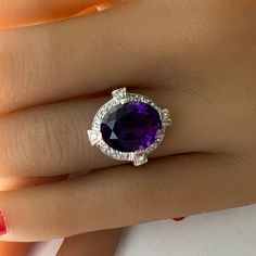 Ring width at top: 5/8 inch Ring size: 6 1/2   Can be sized 5 to 9 Diamonds: Natural & Untreated. Estimated 0.25 carats total weight of single cut diamonds. Average H/VS2 quality Amethyst: Fine, natural. Estimated 2 carats It is important that I turnover pieces that have been used in our costume/prop rentals. To show you my appreciation I'm incIuding a gift of c. 1980 bold agate pin. I AM PRIMARILY A JEWELRY MANUFACTURER AND DIAMOND DEALER IN THE LOS ANGELES JEWELRY DISTRICT - dufaujewelry.com. Timeless Purple Gemstone Rings, Timeless Round Purple Jewelry, Timeless Purple Jewelry For Formal Occasions, Timeless Purple Round Jewelry, Formal Rings With Round Gemstone Accents, Luxury Round Amethyst Ring With Gemstone Accents, Oval Amethyst Ring With Gemstone Accents For Formal Occasions, 14k Gold Round Amethyst Ring With Gemstone Accents, 14k Gold Amethyst Ring With Gemstone Accents