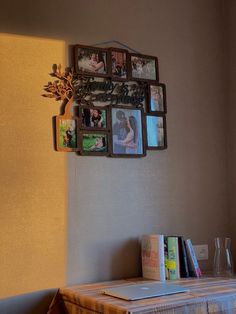 a shelf with several pictures on it next to a window