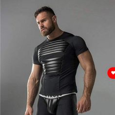 Maskulo T-Shirt Armored Spandex With Front Pads Tp11-90-Large. Top -Leather-Look Spandex Chest Pads -Material: 9% Polyester, 10% Elastane -Colors: Black Skinny Fit - Slimmer Through The Body, Properly Contours The Body Scruffy Men, Gay Fashion, Mens Gear, Men In Black, Mens Workout Clothes, Black Skinnies, Sport Fashion, Beards, Male Models