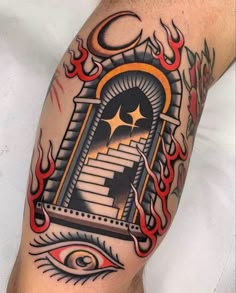 a man's arm with an eye and door tattoo on it