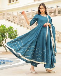 This 3 Pc anarkali Suit set is designed in mul-mul cotton fabric with Gota work mul-mul Dupatta. Kurta Length - 50, Mul-mul Cotton, Gota work With on hem & sleeves. Pant length - 38, Mul-mul cotton. Dupatta - Mul-mul cotton, gota work on edges. Fabric - mul-mul cotton. Color - Bottle Green CARE: dry clean only. Shipping - 10-12 working days. DISCLAIMER - The color of the product may be differ from the image 10-12% due to camera and lights and screen settings of device. Cotton Anarkali Dress With Self Design, Girls Dress Design, Mood Designer Fabrics, Lace Dress Design, Fancy Suit, Simple Kurti, Gota Work, Cotton Dupatta, Anarkali Suit