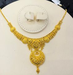 "Indian designer choker necklace , 916 Yellow Gold GOLD PURITY : pure 22k / 916 gold purity Appx Weight: 17.70grams Length : 16-17\" inches Length Colour : YELLOW GOLD Hallmark: Hallmarked 916 stamp Hook: '' fish hook Design :Beautiful choker necklace indian style pendant necklace set. Authentic 916 Gold FAQs Q: Is it real gold? A: yes it's real authentic genuine 916 gold Q: can pawn? A: yes it's pawnable ⭐️GoForGold⭐️ It's time to stock up gold" Luxury Yellow Gold Choker For Wedding, Luxury Yellow Gold Filigree Bridal Necklace, Luxury Yellow Gold Kundan Pendant Necklace, Luxury Yellow Gold Kundan Temple Necklace, Luxury Yellow Gold Kundan Necklace For Celebration, Luxury Yellow Gold Temple Necklace With Intricate Design, Luxury Yellow Gold Temple Necklace For Rituals, Luxury 22k Gold Yellow Temple Necklace, Luxury 22k Gold Chandbali Necklace