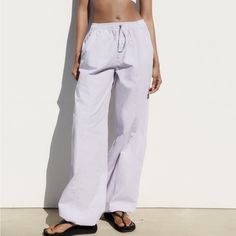 New With Tags Zara Lilac Parachute Pants With Side Pockets. Purple Relaxed Fit Wide-leg Pants, Purple Relaxed Fit Straight Bottoms, Purple Relaxed Fit Straight Pants, Spring Purple Wide Leg Pants With Pockets, Purple Wide-leg Pants With Relaxed Fit, Purple Relaxed Fit Trousers, Purple Relaxed Fit Wide Leg Pants, Zara Cargo Pants With Relaxed Fit, Zara Relaxed Fit Straight Cargo Pants