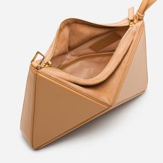 Our architectural, origami inspired shoulder bag, now has a new dimension. It can be converted into a wrist bag just with a quick move. The shoulder strap can easily be removed, so you can slung it from your wrist or use as a clutch. It has plenty of room inside for your essentials including a large phone, small wallet, and 300 ml water bottle. Made from smooth leather and has a suede top with two-way zip fastening. Interior features two slip pockets. Crafted from smooth calf leather. Canvas lin Architectural Origami, Wrist Bag, Suede Top, Suede Tops, New Dimension, Secret Sale, New Launch, Small Wallet, Smooth Leather