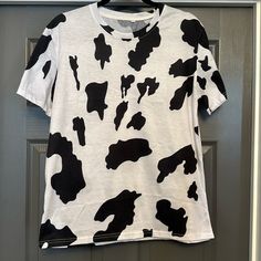 Fun Cow Printed Tee. Never Worn Casual Cow Print T-shirt For Summer, Trendy Cow Print Tops For Spring, Cotton Cow Print T-shirt With Crew Neck, Cotton T-shirt With Cow Print And Crew Neck, Short Sleeve Cotton Tops With Cow Print, Cotton Crew Neck T-shirt With Cow Print, White Casual T-shirt With Cow Print, White Cow Print Crew Neck T-shirt, Casual Cotton T-shirt With Cow Print