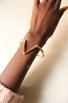 Handmade in Nairobi , Kenya! Crafted with quality brass. SHIPPING Express shipping (via DHL) takes 2-5 WORKING DAYS to be delivered to you. Modern Brass Cuff Bracelet, Trendy Adjustable Cuff Bracelet, Adjustable Brass Bangle For Formal Occasions, Adjustable Open Cuff Gold Jewelry, Modern Adjustable Cuff Bangle, Formal Adjustable Brass Bangle, Adjustable Brass Cuff Bracelet, Adjustable Brass Bangle For Party, Trendy Adjustable Cuff Jewelry