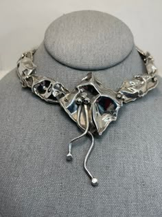 Gorgeous abstract, modernist handmade, one of a kind necklace. Made by Marksz out of Palm Beach. Lovely crinkle design. Marksz and his wife have been making one of a kind jewelry for over 30 years. 46.9 grams. 18 inches neck length. Marked DMW. Acid tested for sterling. Mint condition. Unique Hand Cast Metal Necklaces, Contemporary Sculptural Jewelry For Formal Occasions, Unique Metal Jewelry With Artistic Design, Contemporary Silver Jewelry With Artistic Design, Unique Artistic Metal Jewelry, Artisan Silver Necklace With Unique Design, Modern Metal Jewelry With Artistic Design, Hand Cast Modernist Jewelry For Gifts, Modernist Hand-cast Jewelry For Gifts