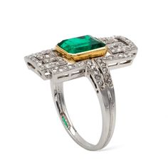 Art Deco Emerald and Diamond Plaque Ring For Sale at 1stDibs Art Deco Diamond Emerald Ring Octagon Shape, Gia Certified Green Emerald Art Deco Ring, Art Deco Emerald Ring With Baguette Cut, Formal Rectangular Emerald Diamond Ring, Art Deco Green Emerald Cut Diamond Ring, Green Emerald-cut Art Deco Diamond Ring, Formal Emerald Cut Emerald Ring With Pave Setting, Rectangular Emerald Diamond Ring For Formal Occasions, Art Deco Emerald Cut May Birthstone Ring