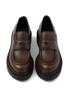 Find PRADA Leather Loafers on Editorialist. brown leather smooth grain enamel triangle logo silver-tone hardware moc stitching round toe chunky rubber sole slip-on style Prada Loafers, Loafers Brown, Chanel 2, Prada Leather, Iconic Bags, Summer Beach Wear, Flat Boots, Ballet Flat Shoes, Pump Sandals