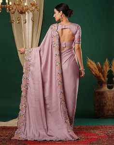 Dusty Pink Embroidery Satin Saree  Dusty Pink Embroidery Satin Saree is a glamorous and luxurious piece. The rich satin fabric drapes beautifully, creating a flowing and elegant silhouette.  Features Of Dusty Pink Embroidery Satin Saree  Traditional Handloom Craft  Intricate Gold Brocade Work  Durability and Longevity   Size Fit  The model height is 5.7 ft   WASH AND CARE  Hand Wash only. Do not dry in direct sunlight    Legal Disclaimer:  The product is guaranteed to be 100% genuine. Product im Saree Traditional, Pink Embroidery, Gold Brocade, Navratri Special, Satin Saree, Draped Fabric, Product Images, Model Height, Satin Fabric