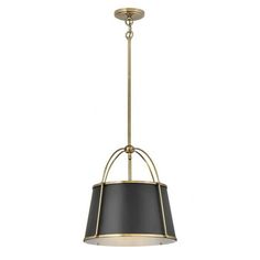 a black and gold chandelier hanging from the ceiling with a light fixture on it