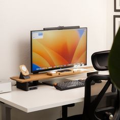 a desktop computer sitting on top of a white desk