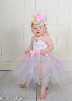 This listing is for the Easter Pastel Tulle Tutu Dress in light pink, baby blue, pastel yellow, and lavendar with a satin halter tie as pictured in your choice of size.  Matching Over the Top Bow and Headband set is optional.  DETAILS:- double layered tutu for extra fluff- headband and bow are optional- 0- 6 months- 12" length from top to bottom of dress - 6-12 months- 15" length from top to bottom of dress- 12-24 months- 18" length from top to bottom of dressCustomize a beautiful baby, infant, Easter Multicolor Tulle Tutu Dress, Multicolor Tulle Tutu Dress For Easter, Sweet White Tutu Dress For First Birthday, Fitted Pink Tutu Dress For Easter, Pink Fitted Tutu Dress For Easter, White Tulle Tutu Dress For Easter, Pink Tutu Dress For First Birthday Easter, Pink Tutu Dress For Easter Party, Multicolor Tutu Dress For First Birthday In Spring