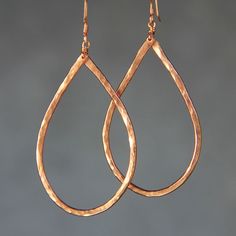 This unique large hoop earrings are handmade using thick copper filled wire. Free shipping for US customers. Perfect gift for any occasions. Teardrop is the best shape of earrings which compliment all face shapes. The teardrop implies the purity and softness of water. It stands for the irresistible natural force. It is gravitating, playful and feminine. I hand-textured each piece of the jewelry. Due to the handmade nature of these earrings, each set may vary very slightly. However, that is the b Elegant Teardrop Copper Hoop Earrings, Elegant Copper Teardrop Hoop Earrings, Rose Gold Teardrop Hoop Earrings Nickel Free, Handmade Rose Gold Teardrop Hoop Earrings, Handmade Teardrop Copper Earrings, Teardrop Rose Gold Nickel-free Hoop Earrings, Copper Teardrop Hoop Earrings With Ear Wire, Copper Wire Teardrop Earrings, Handmade Copper Teardrop Hoop Earrings