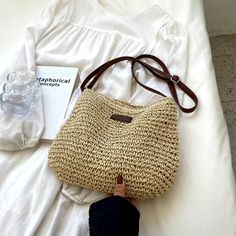 🌞 Embrace the summer vibe with our Summer Elegance Straw Woven Bag, perfectly crafted for sunny adventures. This stylish shoulder bag is made from eco-friendly raffia paper rope, offering a lightweight yet durable design. 🏖️ Boho chic meets practicality, with a spacious interior to carry all your essentials from sunrise to sunset. Whether you're strolling along the beach or enjoying an outdoor brunch, this handbag complements any casual look. 👜 Versatile and vibrant, it transitions effortlessly from a beach bag to a chic messenger crossbody, making it an ideal choice for fashion-forward women on the go. 🌼 Outdoor Brunch, Summer Elegance, Retro Purse, Handbags Casual, Stylish Shoulder Bag, Women Shoulder Bag, Bags Luxury, Crossbody Bag Women, Wedding Bag