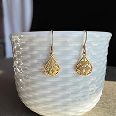 "Filigree Earrings,Flower Earrings, Gold Filigree Earrings, Lace Earrings, Boho Earrings, Hippie Earrings,Dangle Earrings,Gift for Her A departure from our traditional \"Daniela\" style, these triple filigree golden bead drop earrings are for when a little extra glitz is needed.  When you wear these, the shimmering filigree cast a luminous glow on all of your special occasions. These are our favorite go to earrings when a little extra flourish is needed.  Materials: 14K Gold Plated Brass Teardro Teardrop Flower Pierced Earrings Gift, Teardrop Flower Earrings Gift, Bohemian Gold Hypoallergenic Teardrop Earrings, Bohemian Hypoallergenic Drop Earrings, Filigree Drop Earrings As A Gift, Delicate Teardrop Flower Earrings For Pierced Ears, Gift Filigree Drop Earrings, Delicate Teardrop Flower Earrings, Gift Drop Earrings With Filigree Detail