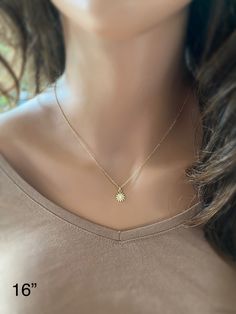 "This solid 14k gold charm is stunning and has a great detail. The slightly curved sun beams and its dome shape add dimension. The pendant measures approximately 8 mm. Now available with the 16 or 18\" dainty solid 14k gold chain. The sun will be suspended on 4 mm open bail (see 1st photo) If you only purchasing the charm, select bail size: 4 mm 14k open jump ring bail and can accommodate chains up to 1.6 mm. 6 mm 14k closed bail that can suit thicker necklaces. Hallmarked 14K 14k sand dollar ch 14k Yellow Gold Sun Design Necklace, Gold Sun-shaped Jewelry For Everyday, Yellow Gold Charm Necklaces With Sun And Moon Design, Gold Dainty Sun Design Charm Necklace, Dainty Gold Charm Necklace With Sun Design, Celestial Yellow Gold Charm Necklaces For Everyday, Celestial Yellow Gold Charm Necklaces, Elegant Sun Design Pendant Jewelry, Elegant Sun-shaped Jewelry For Gifts